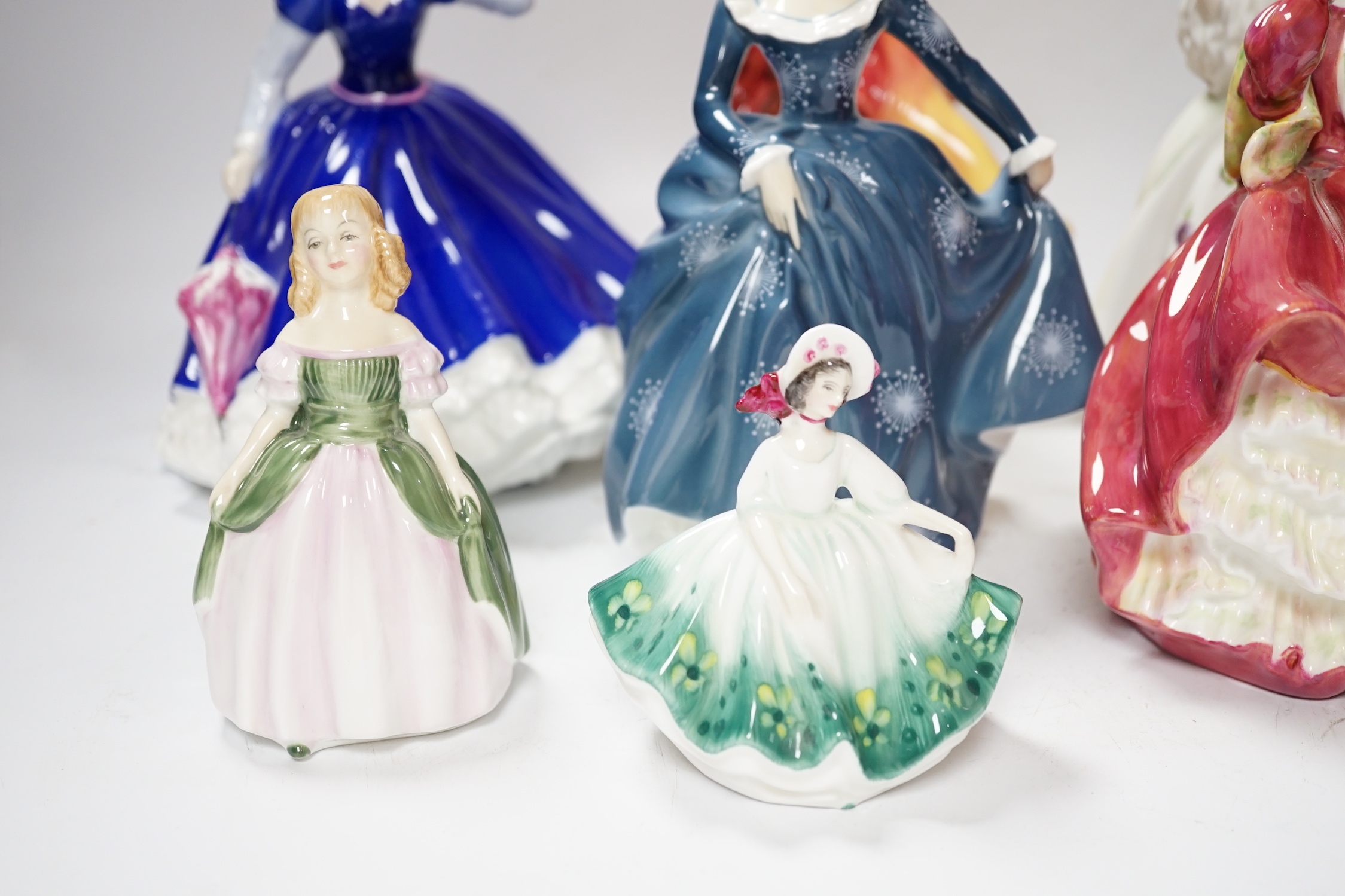 Seven Royal Doulton figurines, (two boxed), tallest 21cm